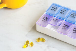 A pill box filled with vitamins.