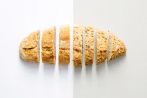 New bread slices on white background.